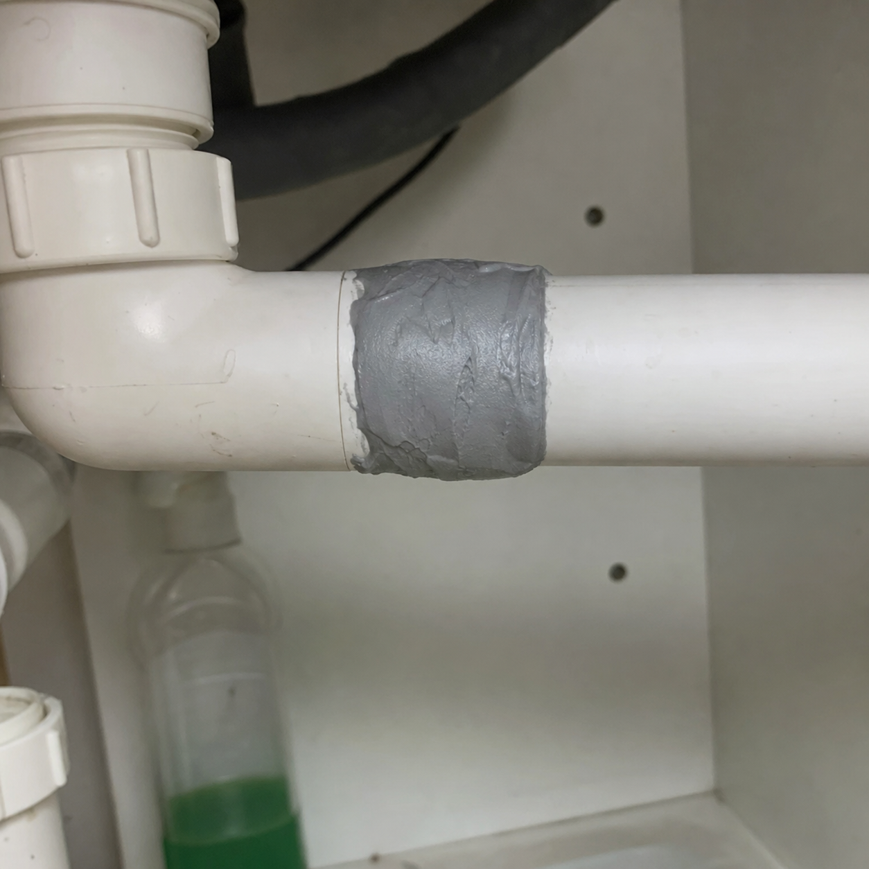 Repair putty used on leaking pipe